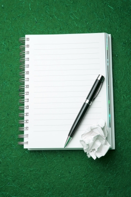 Notebook-And-Pen-With-Crumbled-Paper