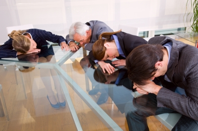 Employees-With-Their-Heads-Down