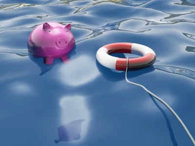 piggy-bank-lifebuoy-in-water