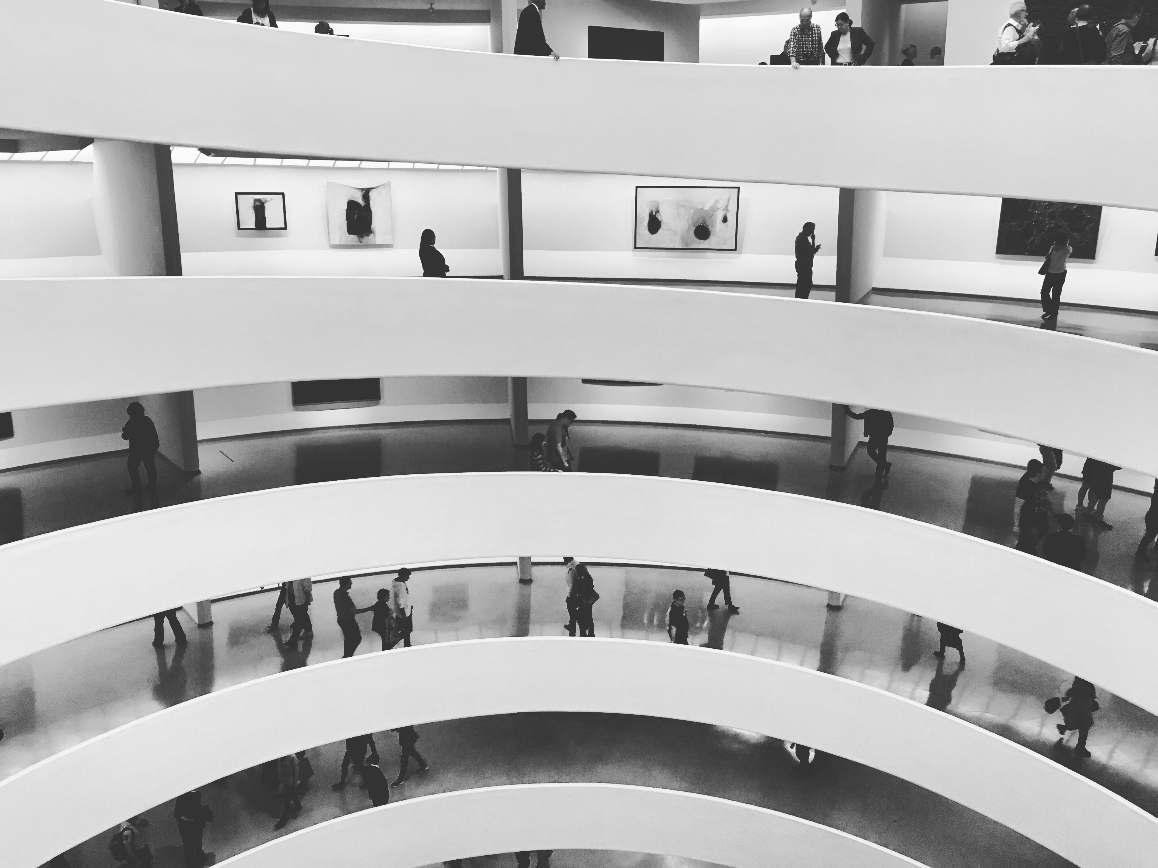 People walking on floors of building