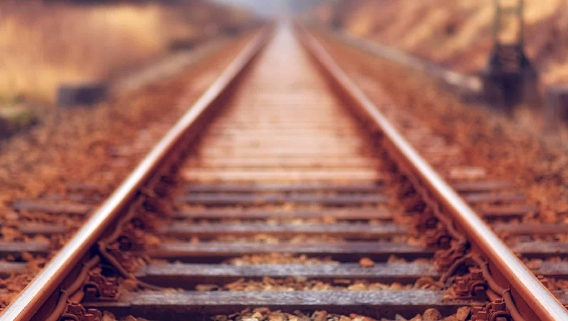 Train tracks with fall leaves