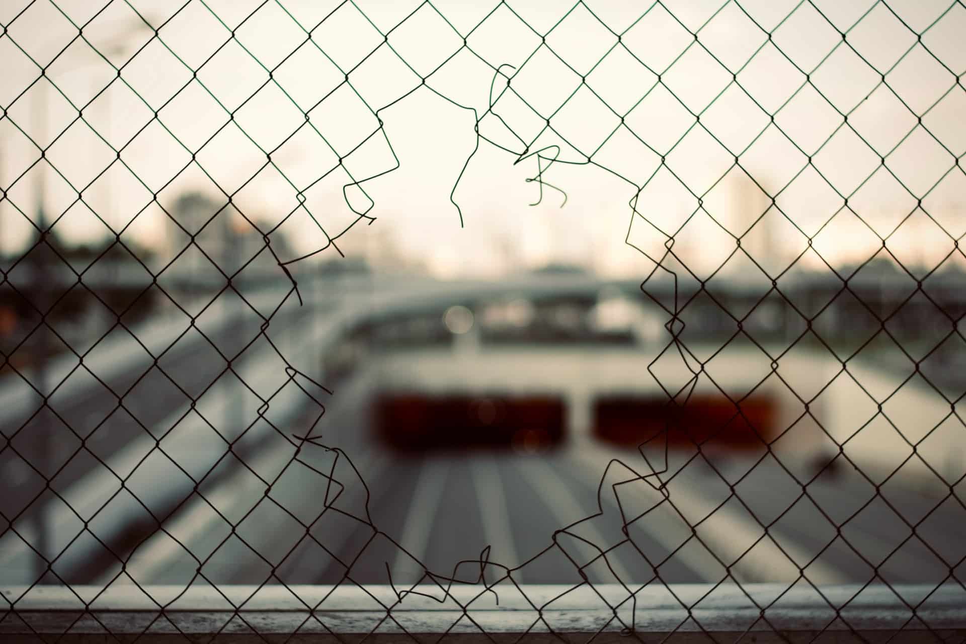 Hole in a fence